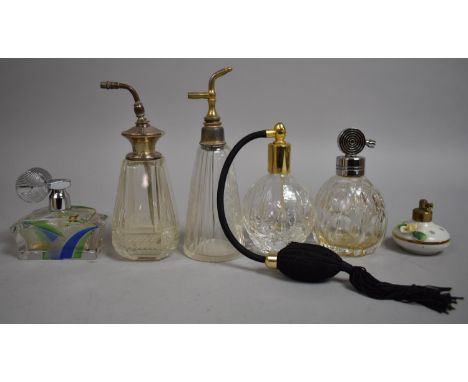 A Collection of Glass and Ceramic Perfume Atomisers to Include a Sterling Silver Topped Example 