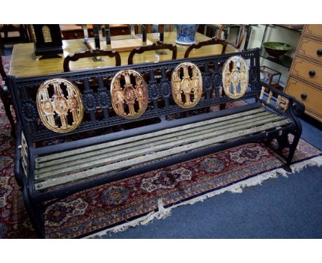 A Victorian cast iron bench, 191cm wide, (s.d.). Condition Report: The bench looks and stands well from first glance.  Howeve