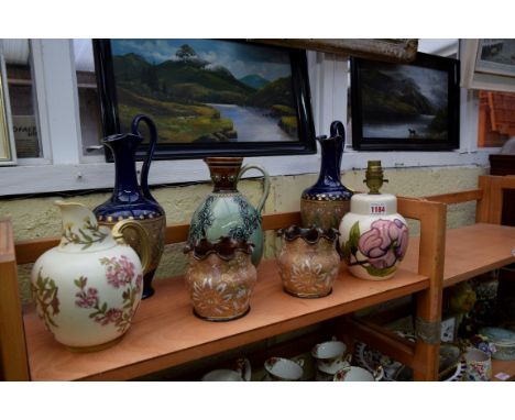A Moorcroft Magnolia pattern lamp base, height excluding fitting 16cm; together with a Royal Worcester ewer, (restored); a Do