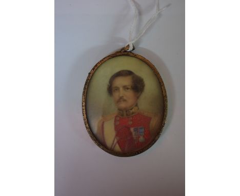 English School, 19th century, head and shoulders portrait miniature of an army officer in red tunic, 6.5 x 5cm. 