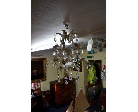 A painted metal and faceted glass drop ceiling light, with leaf decoration. 