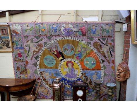 A large tapestry panel, embroidered with the seasons and months of the year and inscribed in Latin, decorated to the centre w
