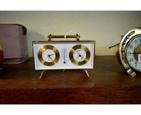 A 1970s Swiza combination timepiece, barometer and thermometer desk set, 14.5cm wide, in original card box.