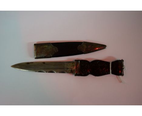 A Scottish silver mounted skean dhu, by Robb of Ballater, Edinburgh 1913, with carved ebony handle decorated Celtic interlace