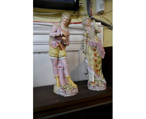 A large pair of French bisque porcelain figures, 39cm high, (chips to fingers on lady). 