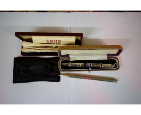 A sterling silver and enamel propelling combination pen and pencil, in box; together with a Yard o'Led propelling pencil, in 