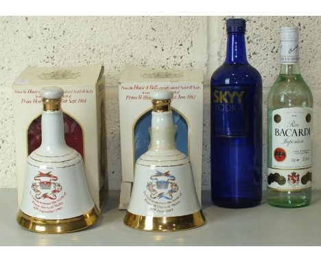 Bell's Scotch Whisky, ceramic commemorative decanter for the birth of Prince William of Wales, 1982 and another, Prince Henry