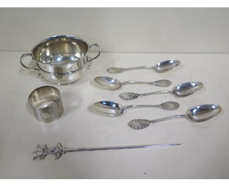 A silver presentation twin handled bowl and a silver serviette ring, and five sterling spoons, total approx 10.6 troy oz on a