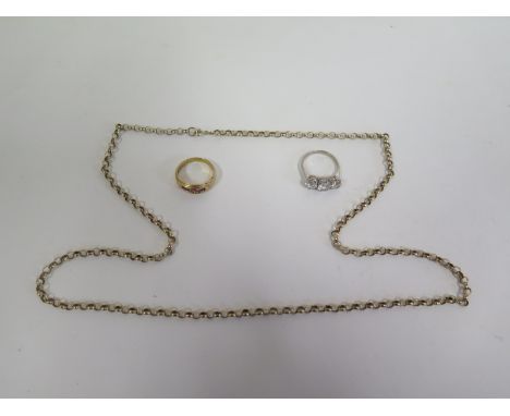 A 9ct gold chain necklace approx 11.4 grams, together with a 9ct gold ring, inset with red stones, approx 2.5 grams, size N -