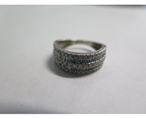 A 9ct white gold blue and white diamond ring - size K, approx 2.7 grams, some usage marks but generally good 