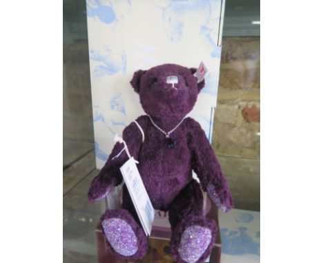 A Steiff Amethyst Bear - 25cm tall, silk - limited edition 1616 of 2000 - as in new condition with original box and certifica