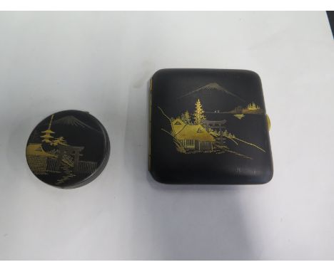 A Janapese compact and cigarette case, inlaid with 24K gold, mirror cracked to compact, some minor wear but generally good 
