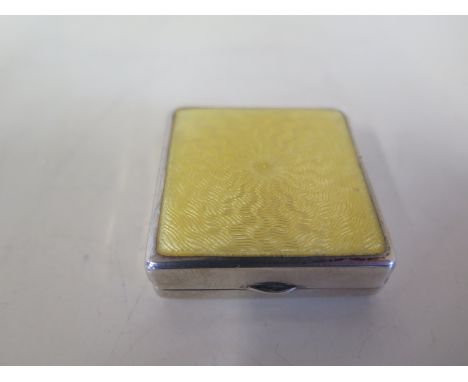 A small silver and enamel compact, London 1929/30 - 4cm x 4cm - in good condition - some rubbing to hallmarks, missing liner 