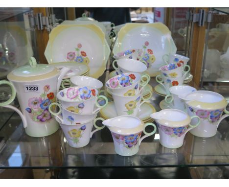 A Shelley floral decorated part tea coffee service - 57 pieces including two sandwich plates, three jugs, teapot, cups saucer