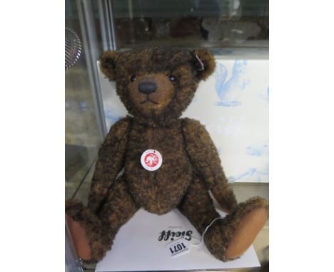 A Steiff Toffee Ted - 37cm tall, mohair - limited edition number 445 of 1500 - in good condition with original box and certif