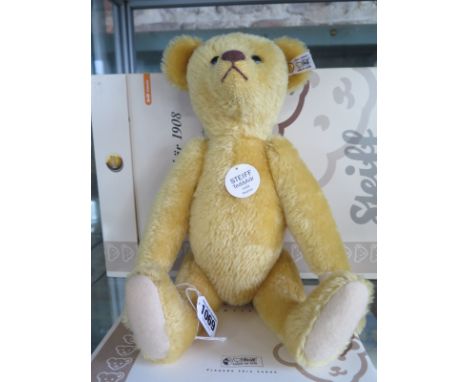 A Steiff 1908 Replica Bear Yellow - 35cm tall, mohair - limited edition number 1957 of 3000 - in as new condition with origin