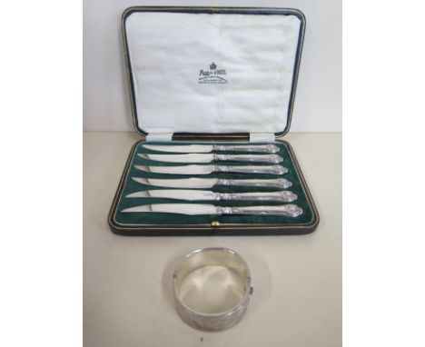 A Mappin and Webb cased set of silver handled Kings pattern knives, also a silver bangle, bangle approx 1 troy oz, overall in