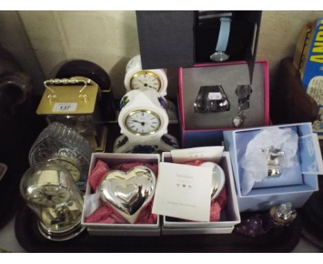 A Tray Containing Boxed Wedgwood Vera Wang Baby Collectables Two Aynsley Ceramic Mantle Clocks Carriage Clocks Etc. 