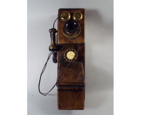 A Vintage Style Wall Mounting Telephone.