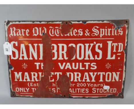 A Vintage Enamel Sign, Sandbrook's Limited, The Vaults Market Drayton Rare Old Wines and Spirits. 