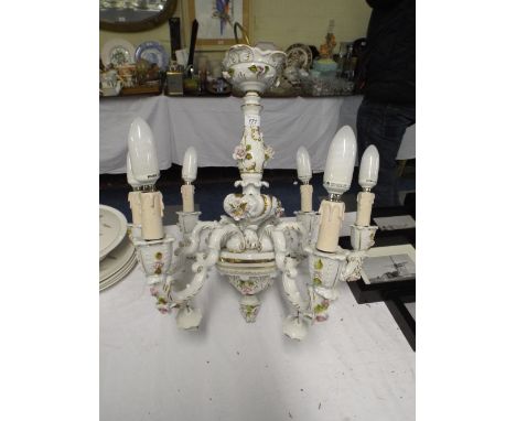 An Italian Ceramic Six Branch Ceiling Chandelier.
