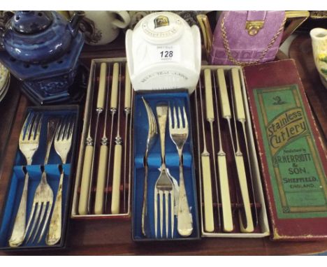 A Tray Containing Boxed Cutlery, Tea Caddy, Novelty Teapots. 