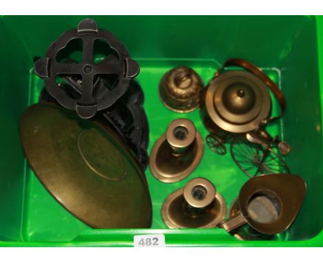A pair of bronze candlesticks, kitchen scale and other items.