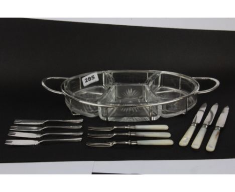 Three pairs of silver and mother of pearl fruit cutlery together with an hors d'oeuvre dish with Mappin and Webb forks.