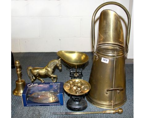 An antique kitchen scale and other items.