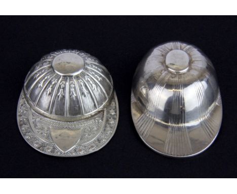Two hallmarked silver jockey cap tea caddy spoons.