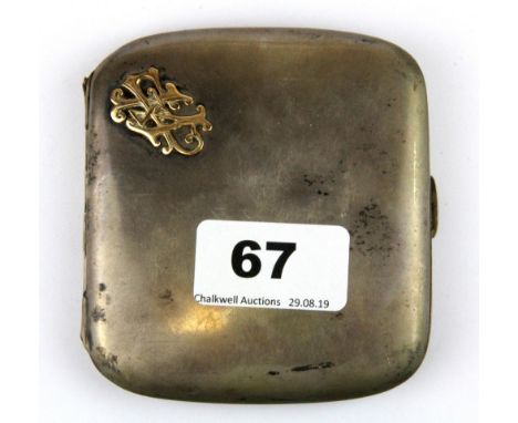 A continental silver cigarette case with gold initials, 9 x 9.5cm.