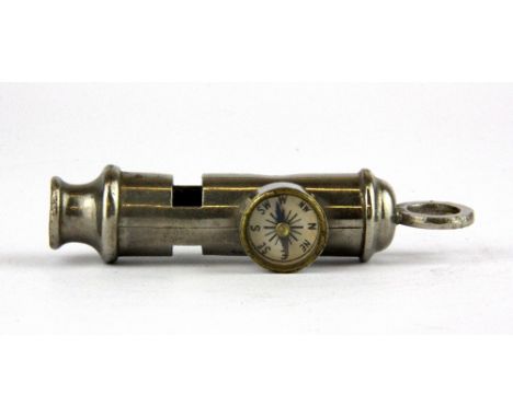 A vintage Boy Scouts whistle compass.