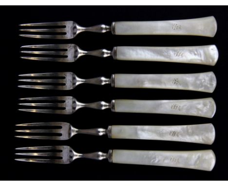 A set of six hallmarked silver fruit forks with mother of pearl handles.
