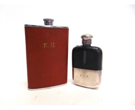 A GLASS HIP FLASK half leather covered with plated screw top and detachable cup base engraved with initials 'R.L.P.' by H. Gr