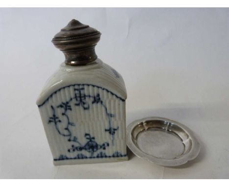 An 18th century continental tea caddy with silver cover the ribbed body with blue and white decoration in Meissen style toget