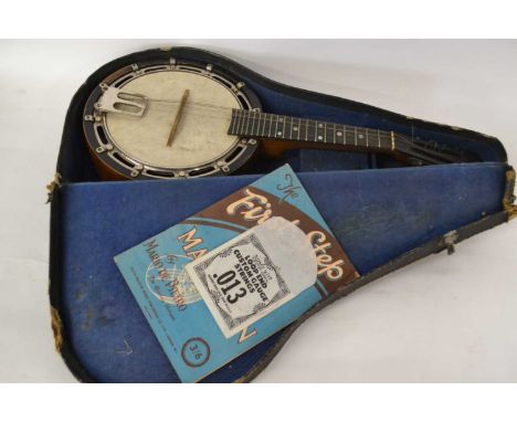 A vintage eight string banjo, no makers name apparent, 60cm high