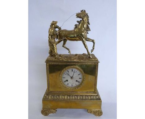A gilt brass mantel clock, the dial marked Pons Paris with Middle Eastern figure and horse above, 44cm high