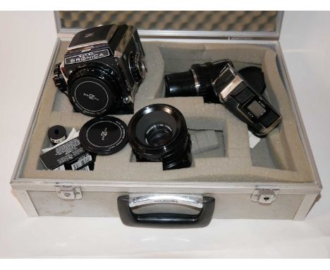 A Bronica Zenza reflex camera with Nikon Nikkor-O f=50mm 33855 lens and Nikkor-Q f=105mm lens iplus further items n an associ