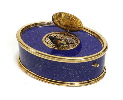 A Faux Lapis Lazuli And Gilt Metal Oval Singing Bird Box, By Reuge  late 20th century, No. 26815/0079, the bird with multi-co