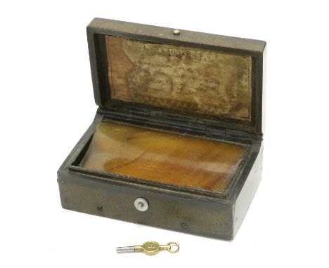 A Composition Tortoiseshell Pictorial Musical Snuffbox titled 'Paris Colonne De La Place Vendome', with single-section comb, 