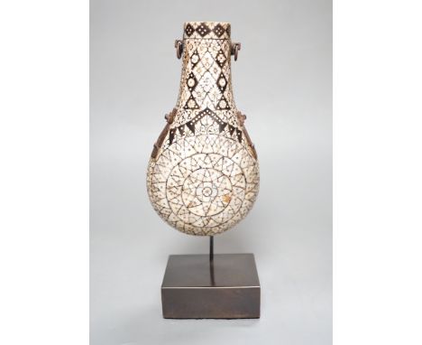 A powder flask, Etawah, India, 19th century, Mother-of-pearl, ivory, horn and black lac on wood - 17cm