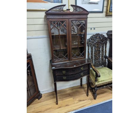 An Edwardian Chippendale revival serpentine mahogany display cabinet, width 76cm, depth 45cm, height 180cm