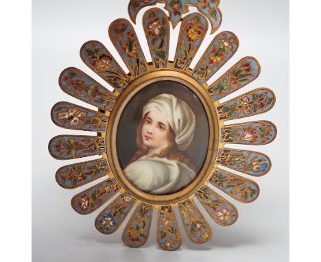 An 19th century Paris porcelain portrait miniature of a lady in a champleve enamelled frame. 13.5cm total exterior frame leng