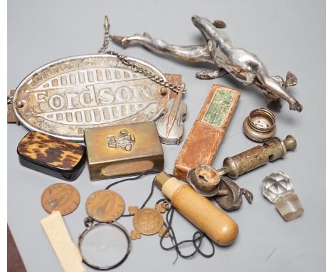 A collection of mixed collectables to include a plated Mercury car mascot, military badges and buttons, a plated double bass 