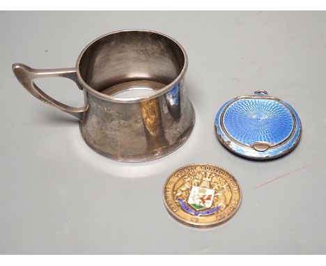 A George V silver cup holder, Birmingham, 1918, a silver and enamel Cardiff &amp; County Horticultural Society medallion and 