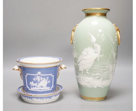 A Royal Worcester pate sur pate 'heron' vase and an early 19th century plant pot and under dish. Tallest 25cm