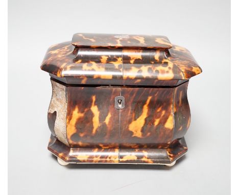 A Regency tortoiseshell bombe shaped two division tea caddy on ivory ball feet (Lid detached, requires restoration) - 18cm wi