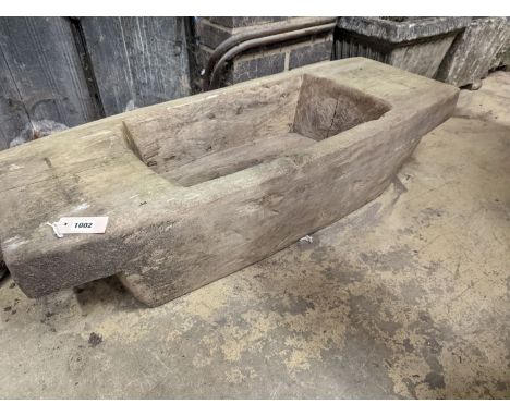 A Continental carved wood trough, width 112cm, depth 44cm