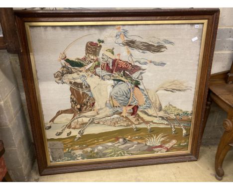 A large Victorian polychrome tapestry panel depicting a Hussar mounted  and Moor in combat (oak framed), panel 145 x 130cm