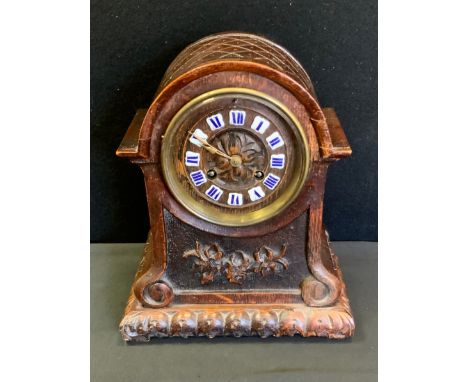 A late 19th century oak mantel clock, blue enamelled Roman numerals, c.1890 